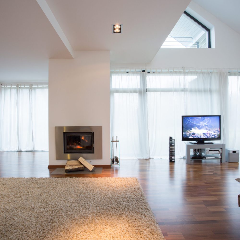 cozy-living-room-with-large-windows-and-fireplace-2025-10-02-11-59-28-utc